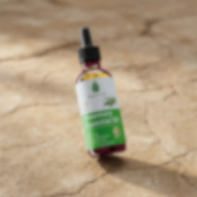 Blurred mystery bottle of Medité hair growth oil, a surprise full-size plant-based formula from the Medité collection