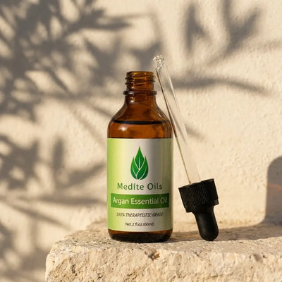 Argan oil for hair growth in a 2 oz amber glass bottle from Medíté