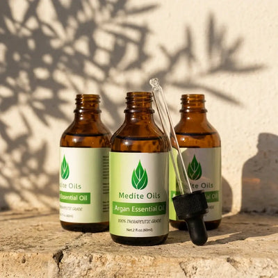 Argan oil for hair growth 3-pack, a three month supply from Medíté in amber glass bottles